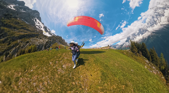 Tandem paragliding take-off with an Evolution 2 instructor in Chamonix.