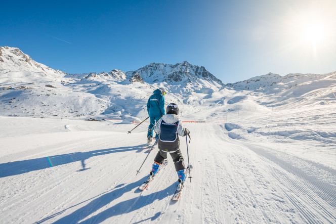 Moniteur de ski Evolution 2 en cours avec un élève à Val Thorens