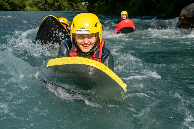 Photo of Evolution 2 clients doing hydrospeed in a river