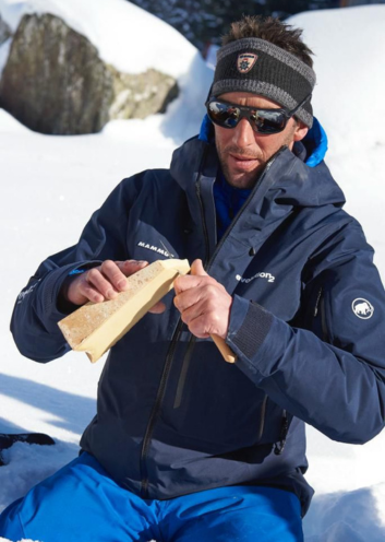 Guide cutting Beaufort cheese during the descent