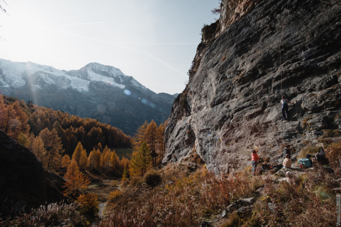 Landscape photo featuring a rock climbing wall.