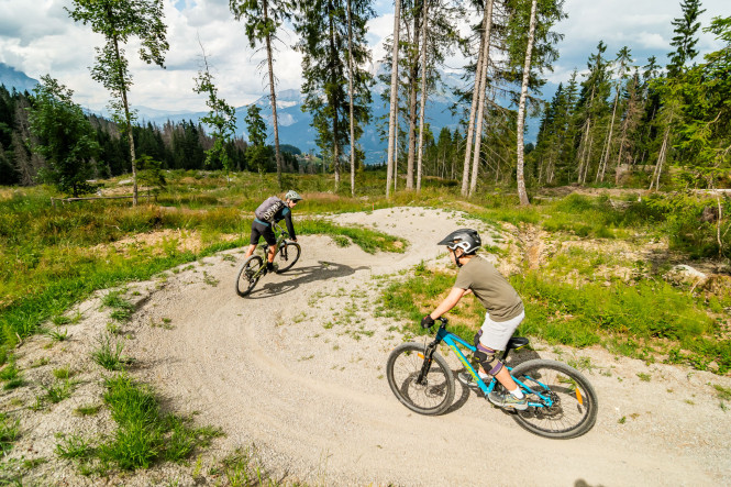 Mountain bike downhill lesson with a child