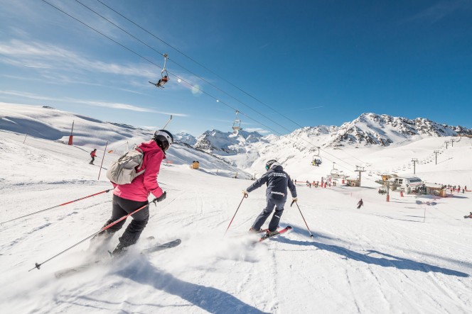Cours de ski adulte avec un moniteur de ski Evolution 2 à Val d'Isère