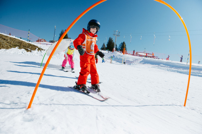 Child in the Evolution 2 Ski School’s Snow Garden in La Clusaz
