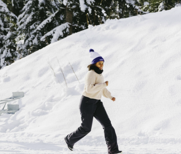 Person running in the snow during a seminar