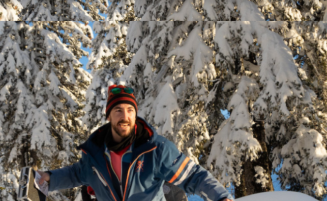 Person running through a snowy forest during a team-building activity