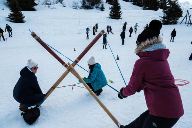 Participants in a seminar in Chamonix taking part in a winter team-building activity